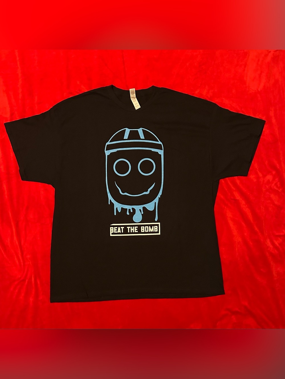 Beat The Bomb Black Graphic Tee with Blue Drip Face